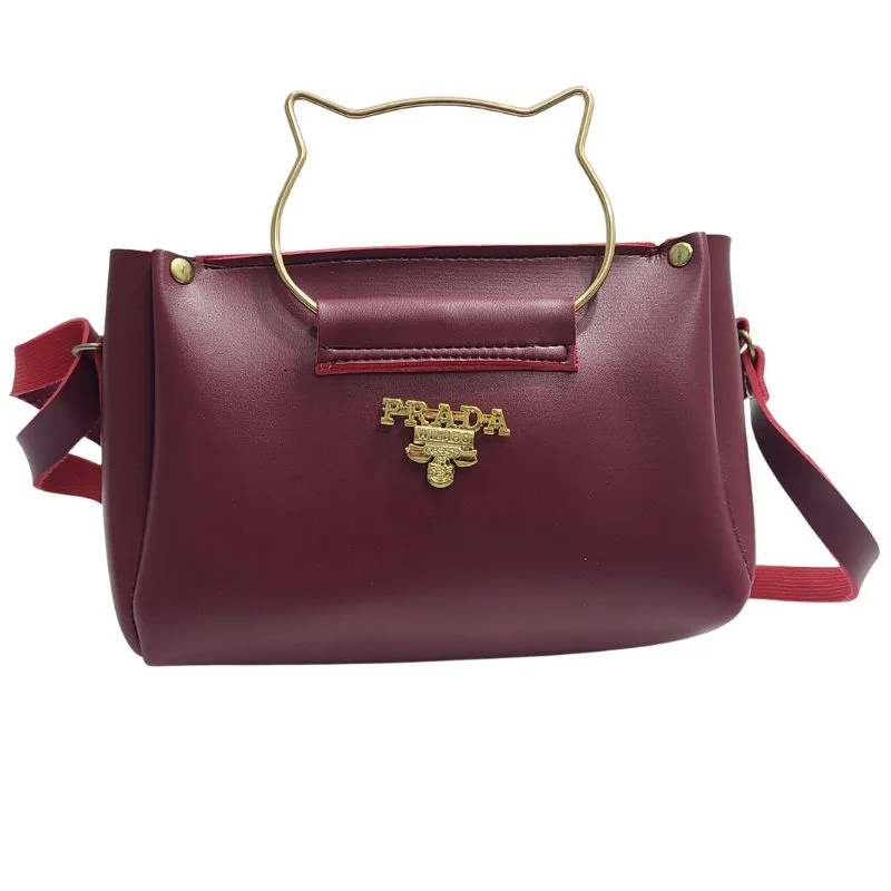 ProductImage-2025-12-13T182549.007_1765632559.webp Maroon Elegant Cat Handle Handbag for Girls & Ladies | Stylish Shoulder & Crossbody Bag with Gold Accents | Adjustable Strap - Image 1