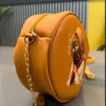 Round Retro Crossbody Handbag | Caramel Faux Leather with Artistic Print for Women - Image 2